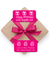 Present with pink ribbon and pink stick on gift tags